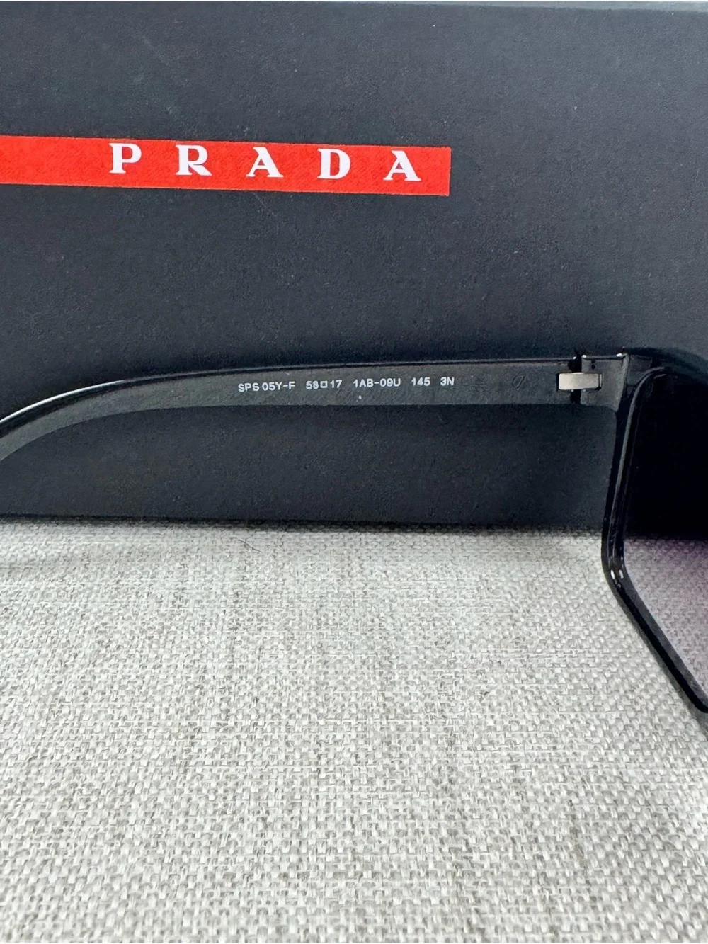 Prada Black Sunglasses with Dark Gray Lenses